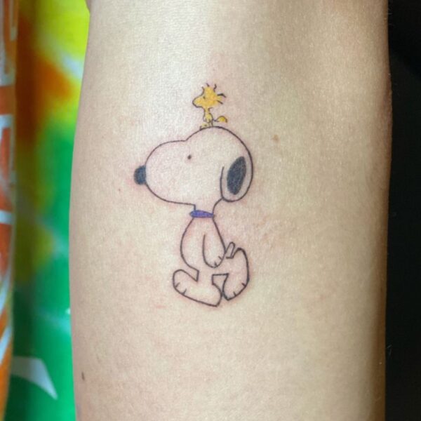 Snoopy Tattoo Ideas for Women: Unique, Charming and Adorable - Blissful ...