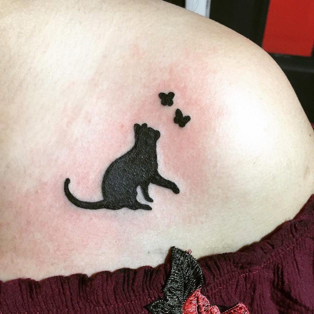 tiny cat tattoo