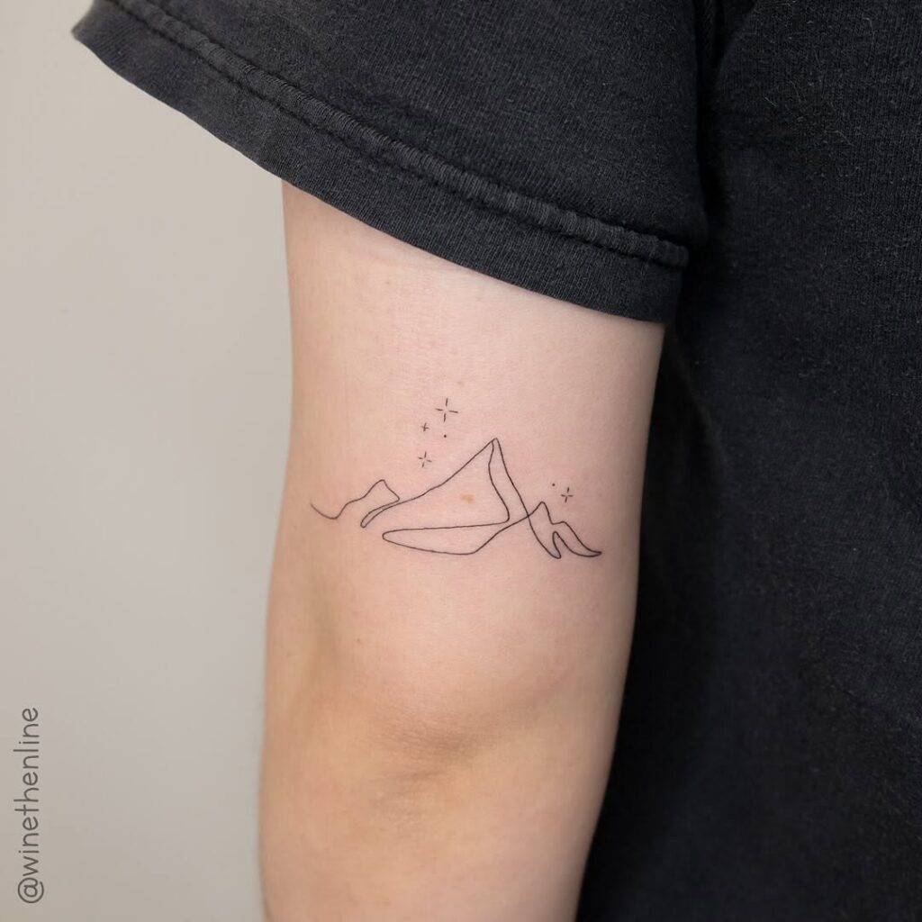 minimalist mountain tattoo